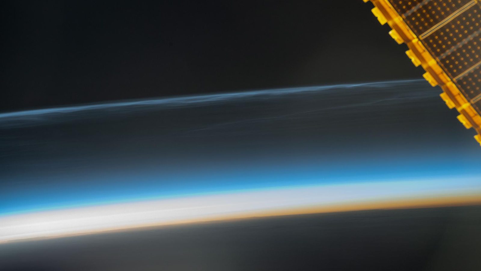 Earth's limb and noctilucent clouds photographed from the International Space Station