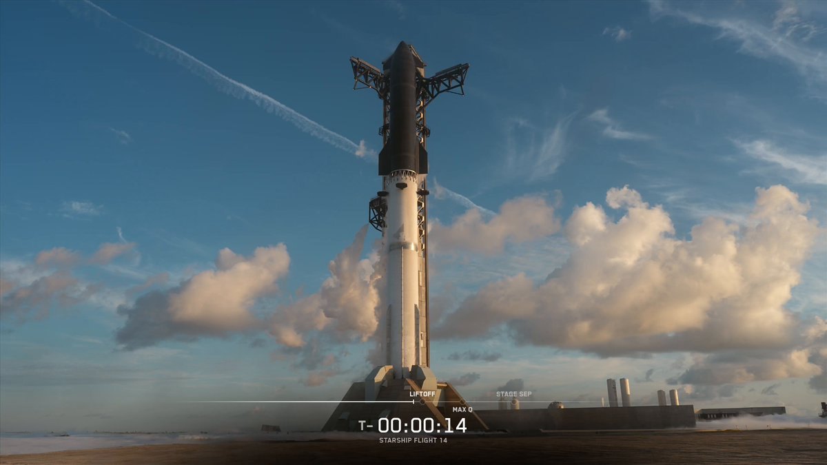Booster 21 and Ship 41 on Pad 2 at Starbase in morning light, 14 seconds before liftoff on Flight 14